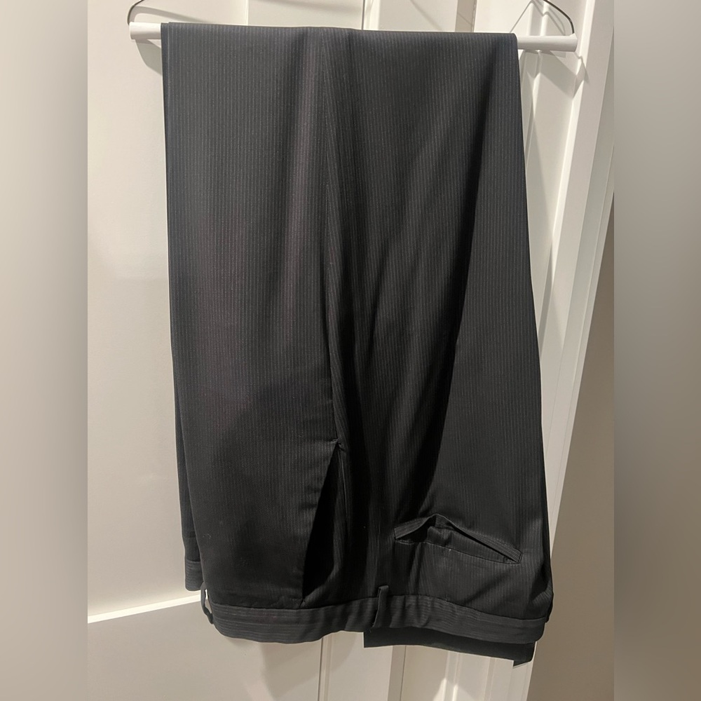 Calvin Klein men’s dress pants. 38 x 32. Black with faint stripes.